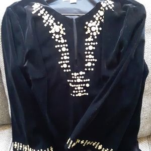 Black velvet top with gold novelty trim.